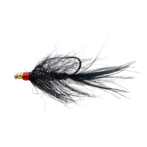 Black fly fishing lure on a white background
