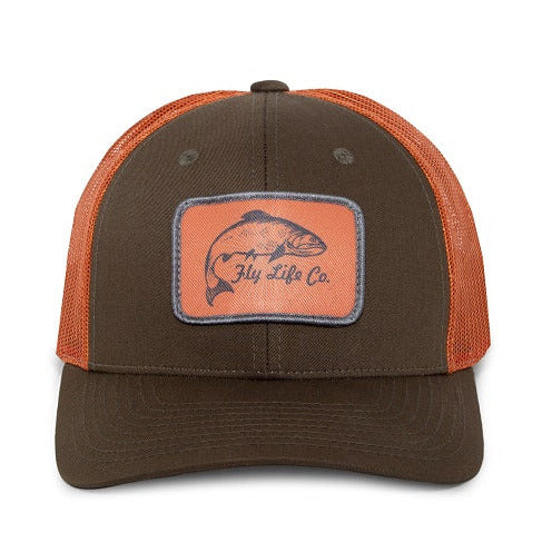 A brown mesh snapback hat with an orange patch on the front featuring a salmon graphic and the text 'FLY LIFE CO'.