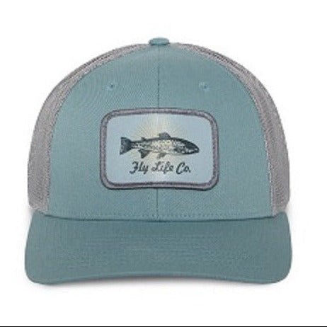 A blue mesh snapback hat with a trout graphic and 'Fly Life Co' text on the front panel.